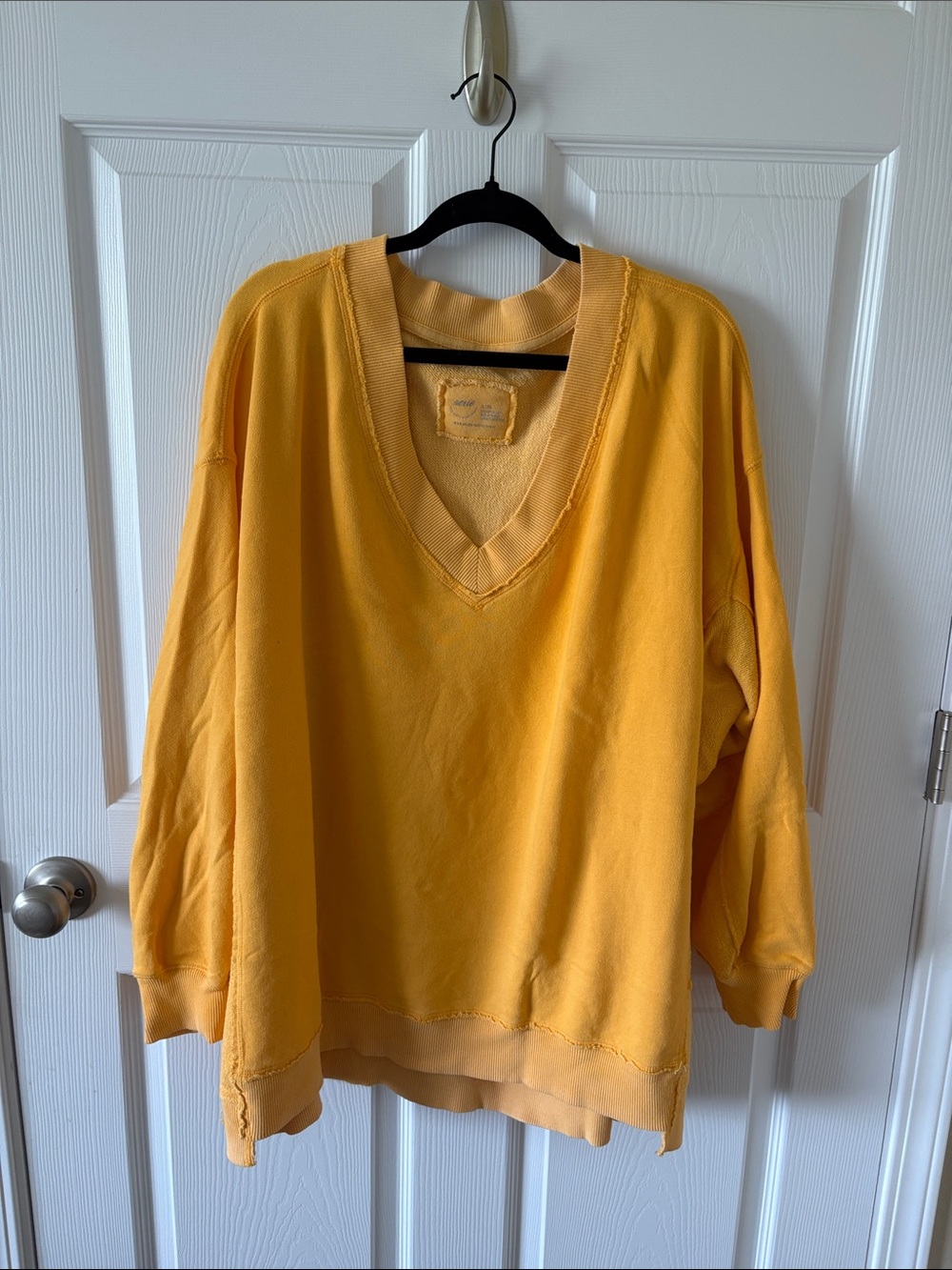 aerie women’s Washed Blue Quarter-snap Sweatshirt and Yellow V-neck sweatshirt - Picture 4 of 9